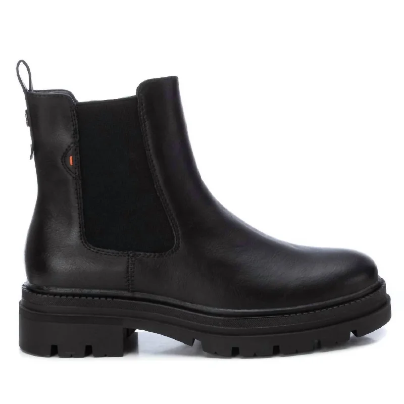 Women's Combat Boots with Studded Details in Olive Green for an Edgy Punk LookWomen's Chelsea Boots In Black Women's Combat Boots with Studded Details in Olive Green for an Edgy Punk LookWomen's Chelsea Boots In Black