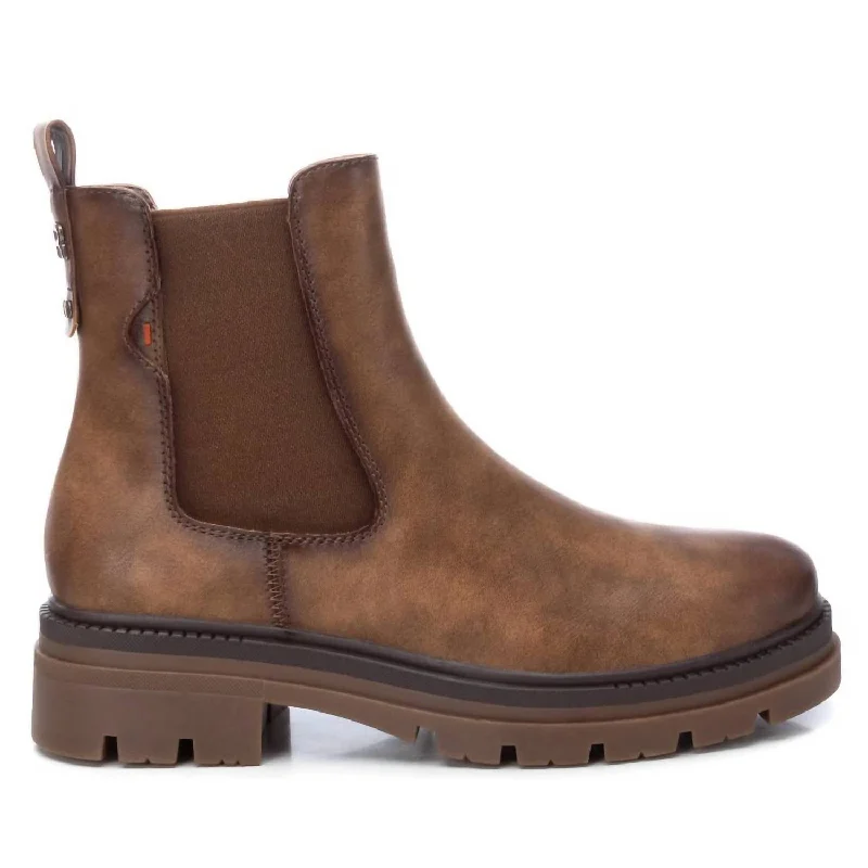 Women's Knee - High Lace - Up Boots in Brown with Buckle Accents for a Western VibeWomen's Chelsea Boots In Taupe Women's Knee - High Lace - Up Boots in Brown with Buckle Accents for a Western VibeWomen's Chelsea Boots In Taupe