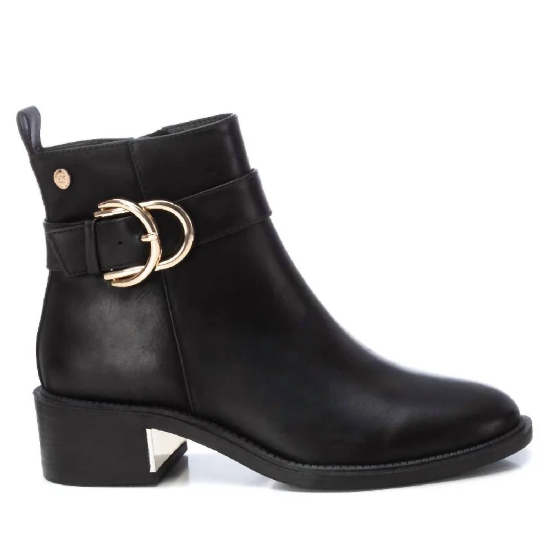 Women's Mid - Calf Suede Boots in Beige with Tassel Trim for a Boho - Inspired StyleWomen's Faux Leather Booties In Black Women's Mid - Calf Suede Boots in Beige with Tassel Trim for a Boho - Inspired StyleWomen's Faux Leather Booties In Black