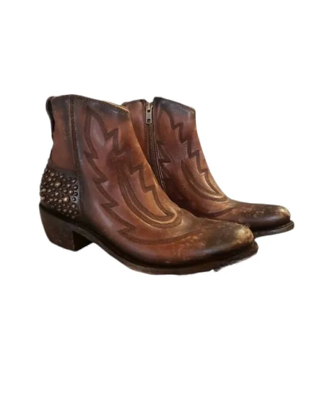 Women's Knee - High Leather Riding Boots in Black for a Classic Equestrian LookWomen's Regina Drica Luggage Booties In Brown Women's Knee - High Leather Riding Boots in Black for a Classic Equestrian LookWomen's Regina Drica Luggage Booties In Brown