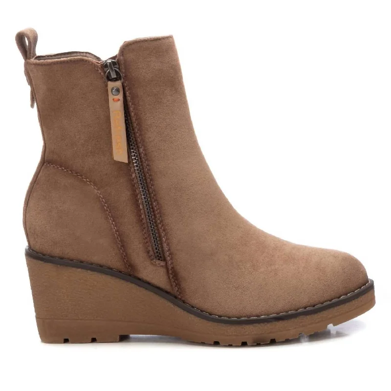 Women's Wedge - Heeled Ankle Boots in Navy Blue for a Comfortable and Trendy OptionWomen's Suede Booties In Taupe Women's Wedge - Heeled Ankle Boots in Navy Blue for a Comfortable and Trendy OptionWomen's Suede Booties In Taupe