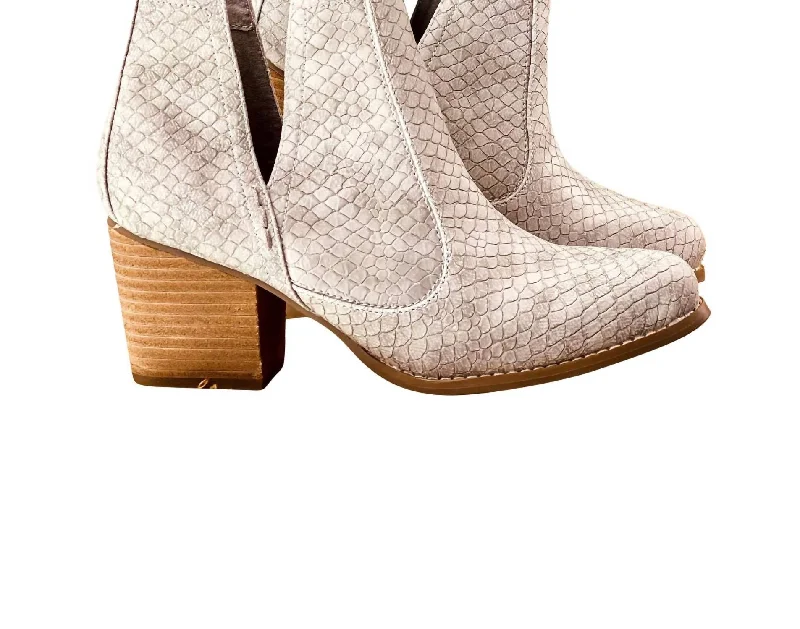 Women's Knee - High Lace - Up Boots in Brown with Buckle Accents for a Western VibeWomen's Tarim Bootie In Grey Women's Knee - High Lace - Up Boots in Brown with Buckle Accents for a Western VibeWomen's Tarim Bootie In Grey