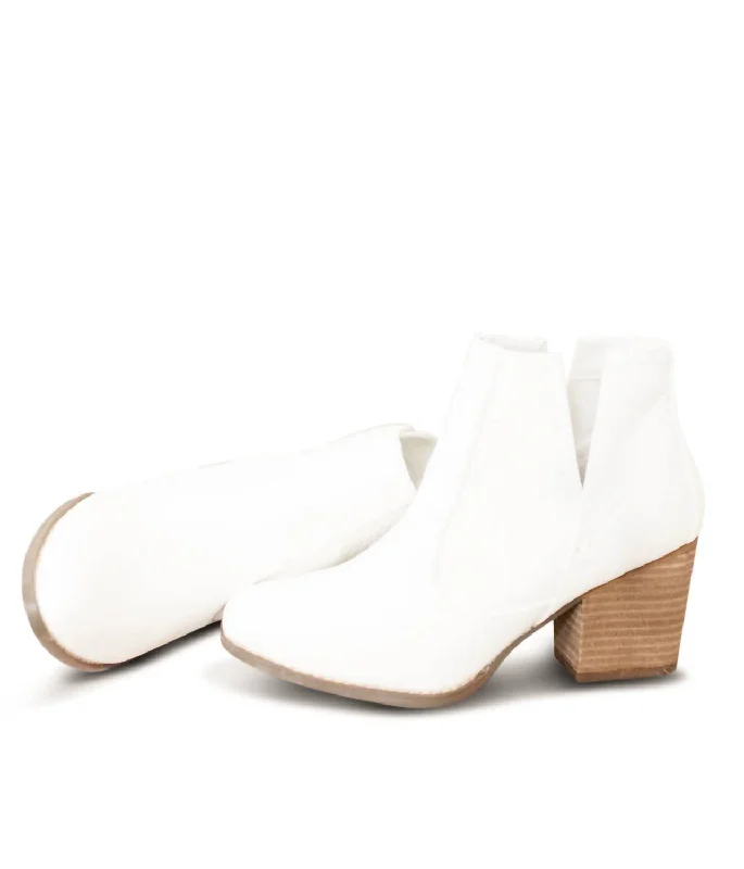Women's Mid - Calf Suede Boots in Beige with Tassel Trim for a Boho - Inspired StyleWomen's Tarim Bootie In White Women's Mid - Calf Suede Boots in Beige with Tassel Trim for a Boho - Inspired StyleWomen's Tarim Bootie In White